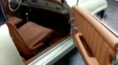 Luxurious new brown interior of a fully restored 1956 Mercedes Benz 190SL