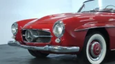 Front view of a 1957 Mercedes-Benz 190SL in classic red color. Classic Cars for sale