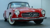 Front view of a 1957 Mercedes-Benz 190SL in classic red color. Classic Cars for sale