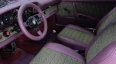 Luxurious burgundy/brown interior of a fully restored 1972 Porsche 911 Targa.